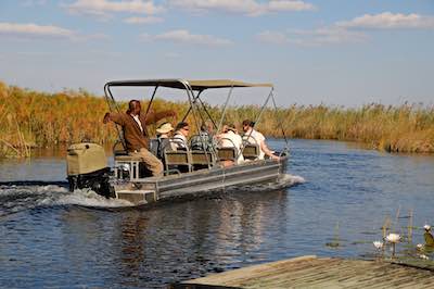 Boat safari at Vumbura Plains, Okavango Delta